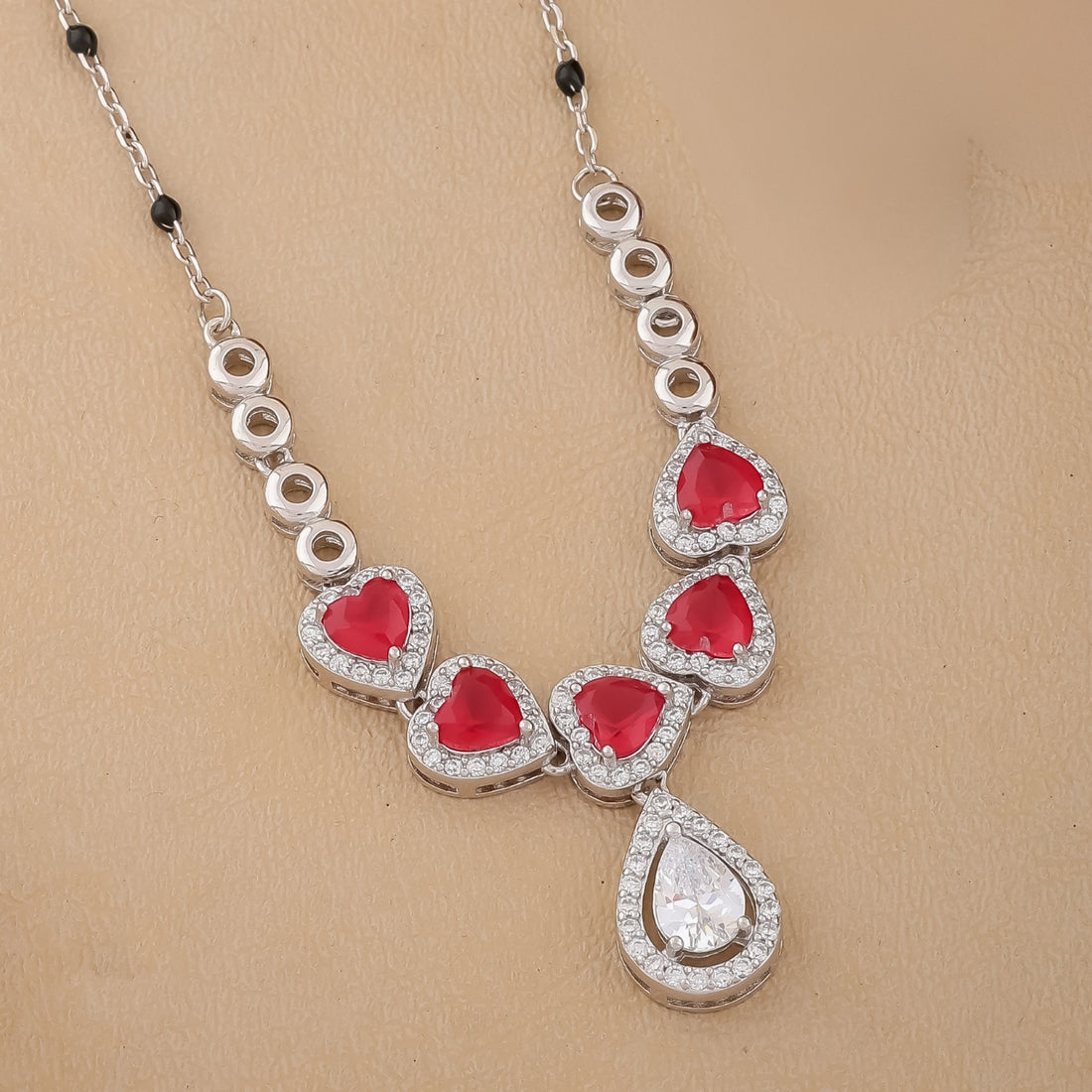 Silver Mangalsutra Necklace Set with Red Heart and Teardrop Stones
